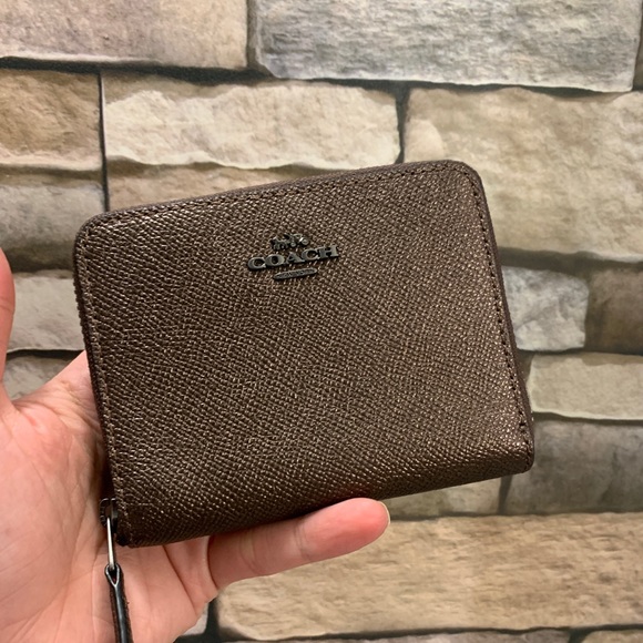Coach Handbags - Authentic COACH Metallic leather zip around wallet